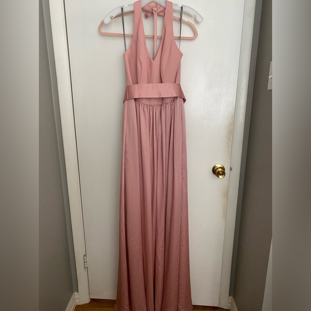 This is a brand new dress. Tags still on. Great condition